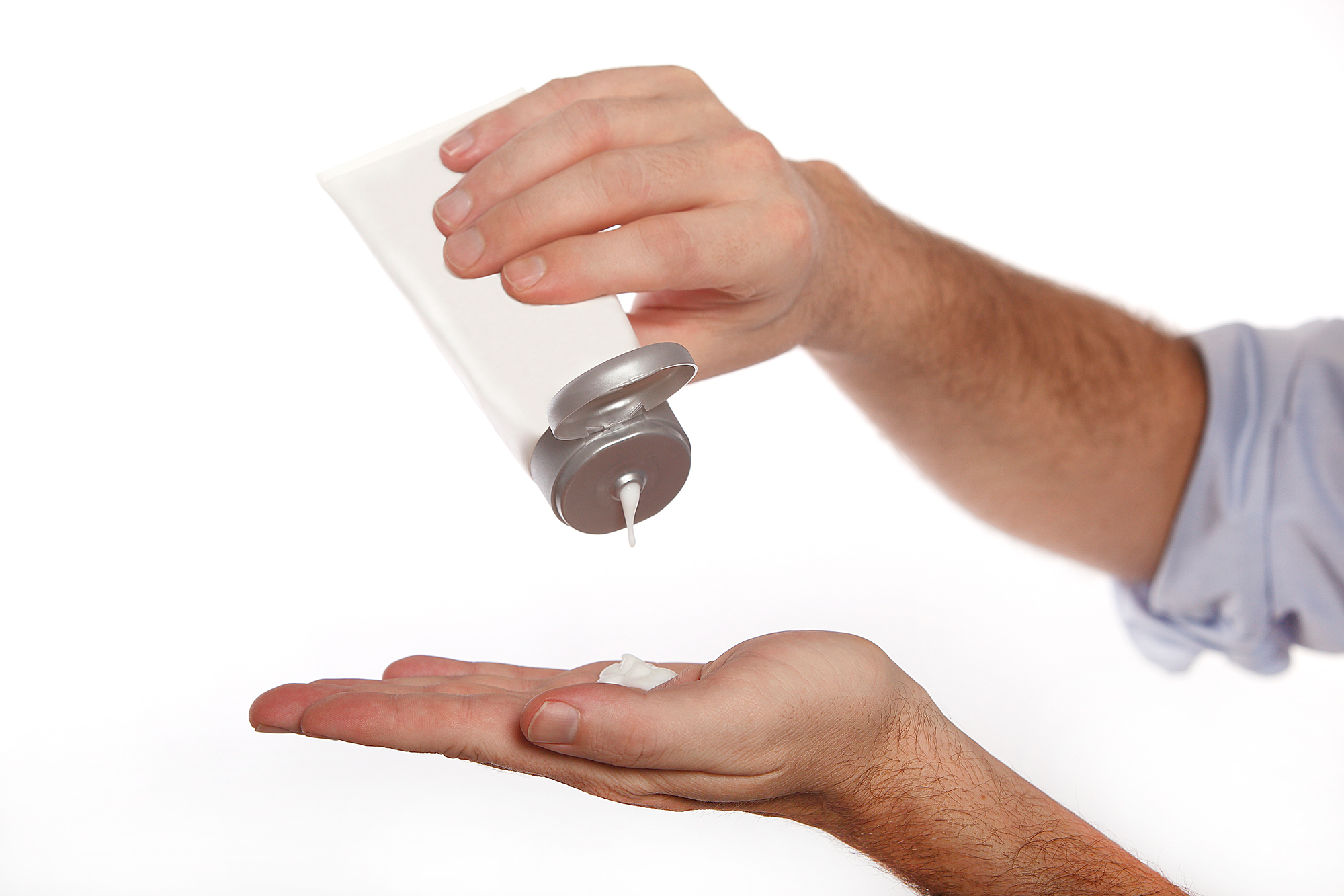 Man uses hand cream